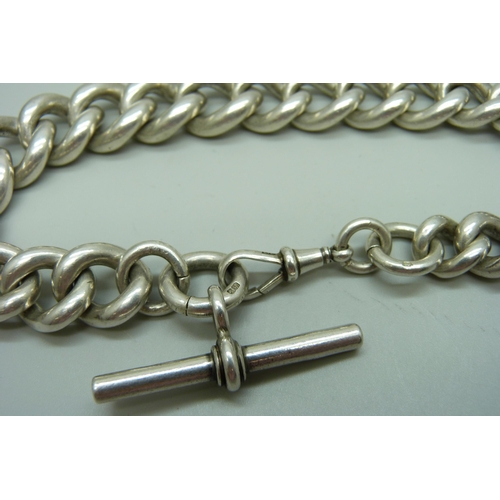 1050 - A heavy silver large curb link watch chain, 163g, 32cm