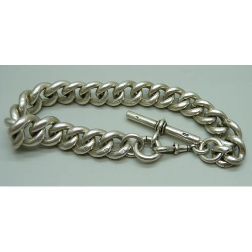 1050 - A heavy silver large curb link watch chain, 163g, 32cm