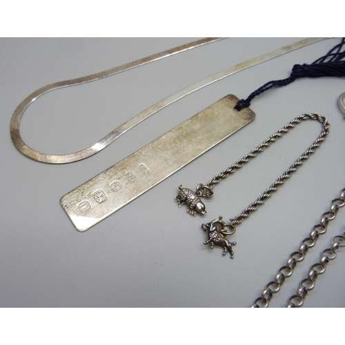 1054 - A silver bookmark, a silver belcher chain and snake chain, 30g, together with a short white metal ch... 