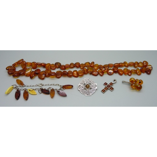 1060 - Amber jewellery including silver set examples, (Celtic brooch clasp a/f)