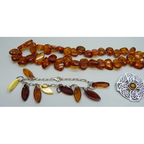 1060 - Amber jewellery including silver set examples, (Celtic brooch clasp a/f)