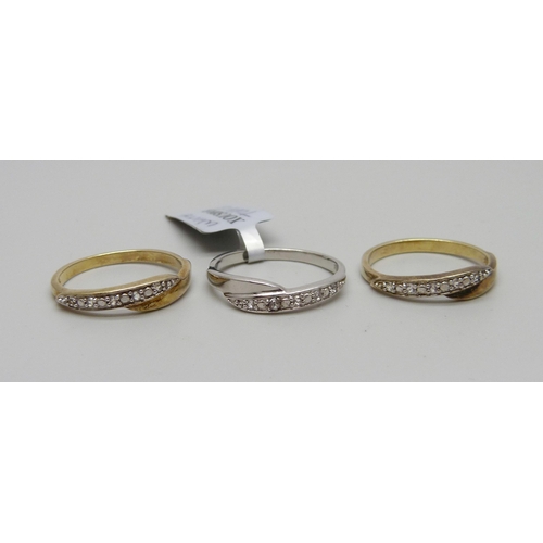 1069 - A set of three silver stacking rings including two gilt, P/Q