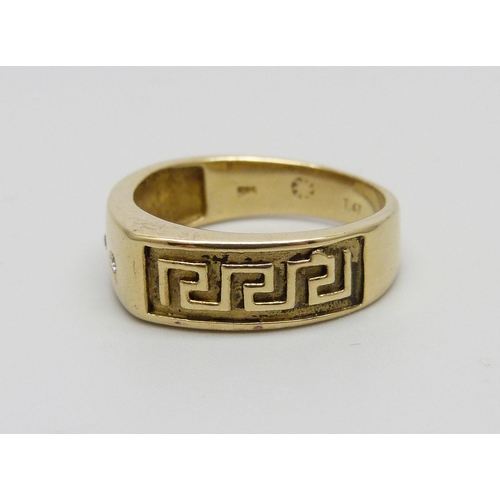 1070 - A 14ct gold Greek key design ring set with three diamonds, 4.5g, N/O