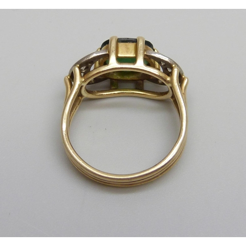 1074 - A 14ct gold, diamond and green stone ring, marked 585, 5.1g