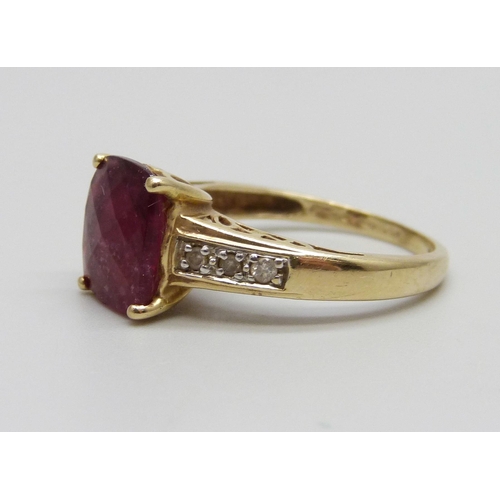 1080 - A 14ct gold ring set with a red stone and diamonds, 3.8g, O/P