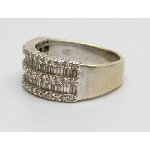 1082 - A white metal and diamond ring, 8.7g, Q