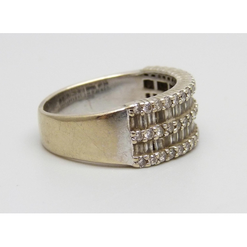 1082 - A white metal and diamond ring, 8.7g, Q