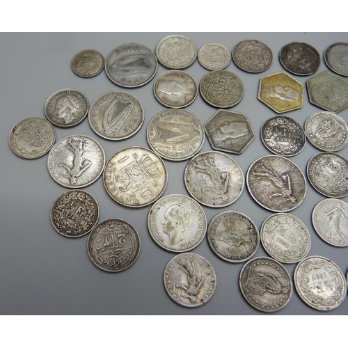 1096 - Silver coins including Irish shillings, 1928, 1931, 1939, 1940, fourteen Swiss half-francs, 1907 and... 