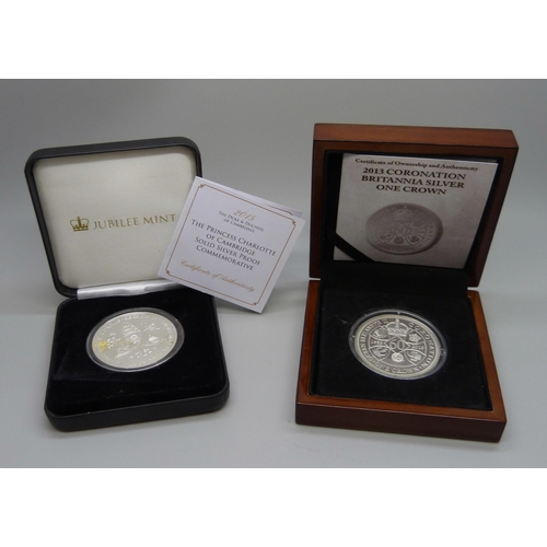 1099 - A 2013 Coronation Britannia silver one crown and a 2015 The Princess Charlotte Solid Silver Proof Co... 