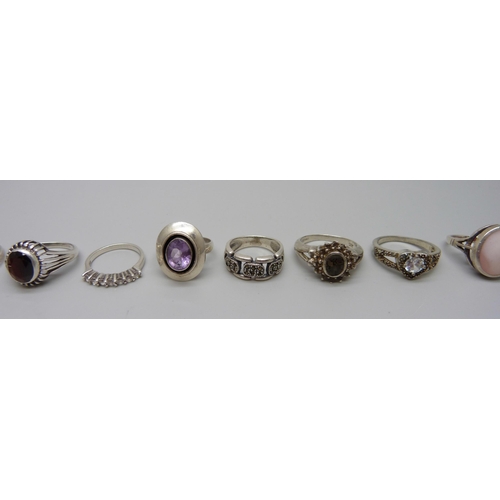 1102 - Twelve silver stone set rings, 36g