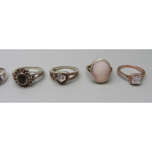 1102 - Twelve silver stone set rings, 36g