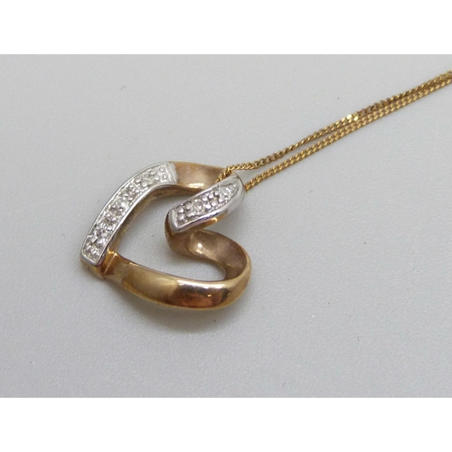 1137 - A 9ct gold and diamond heart pendant on a chain, 1.2cm, 1.4g