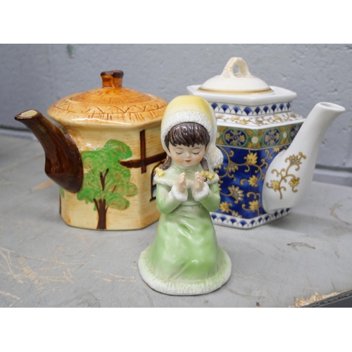 1188 - A collection of ceramics, a brass candlestick, teapots, etc. **PLEASE NOTE THIS LOT IS NOT ELIGIBLE ... 