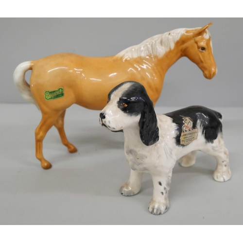 629 - A Beswick palomino horse and a Wedgwood springer spaniel