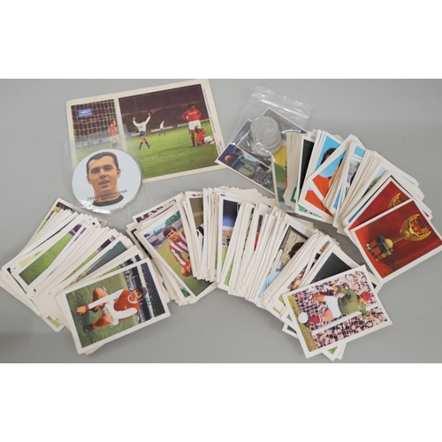 633 - A collection of FKS football stickers, discs and football coin tokens