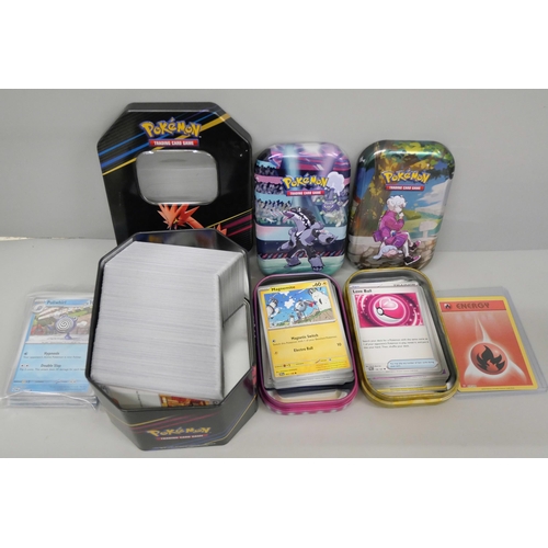 637 - Over 500 Pokémon cards with tins including Holos and Black Star rares