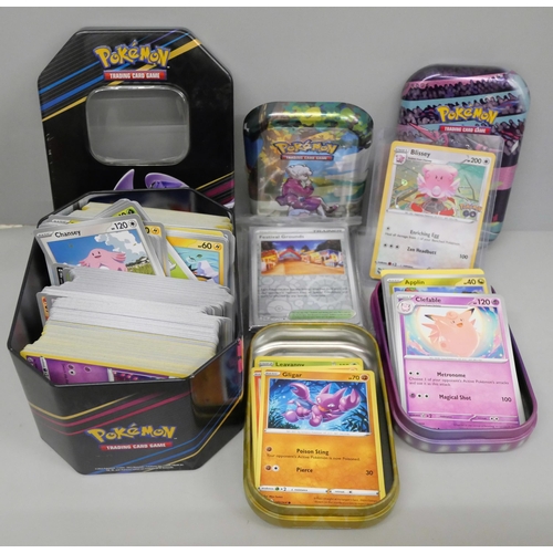 644 - Over 500 Pokémon cards with tins including Holos and Black Star rares