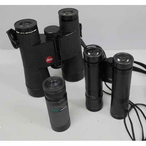 657 - Two pairs of Leitz Trinovid compact binoculars and a Pentax 7x21 monocular, with soft cases