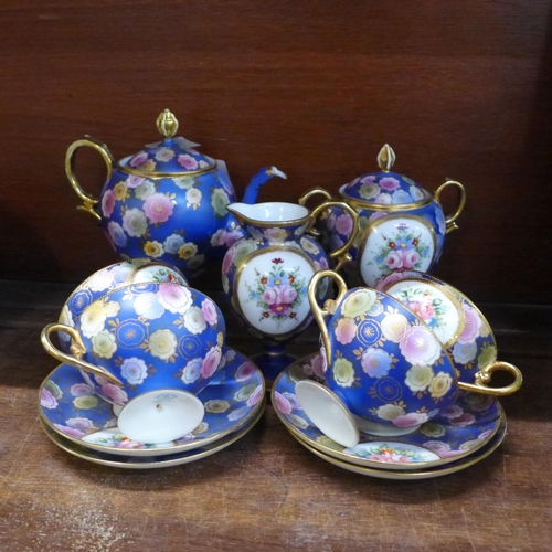 671 - A Noritake Japan ornamental four piece tea service