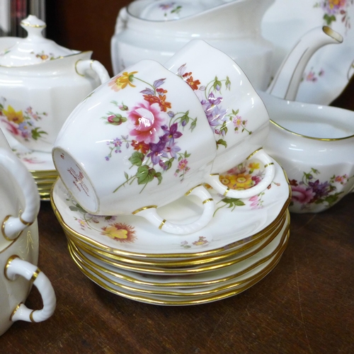 678 - A six setting Royal Crown Derby Derby Posies pattern tea set with milk jug, sugar bowl, tea pot and ... 