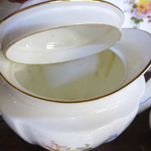 678 - A six setting Royal Crown Derby Derby Posies pattern tea set with milk jug, sugar bowl, tea pot and ... 