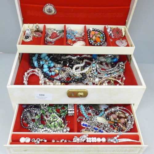 688 - A jewellery box containing costume jewellery