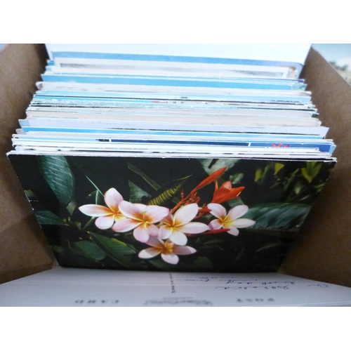 694 - Postcards; a box of postcards, vintage to modern