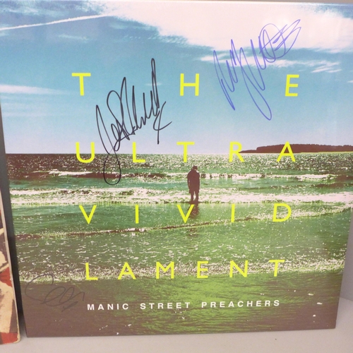 699 - Two signed LP records, Manic Street Preachers and Stone Roses and a signed white card, Nick Mason, P... 