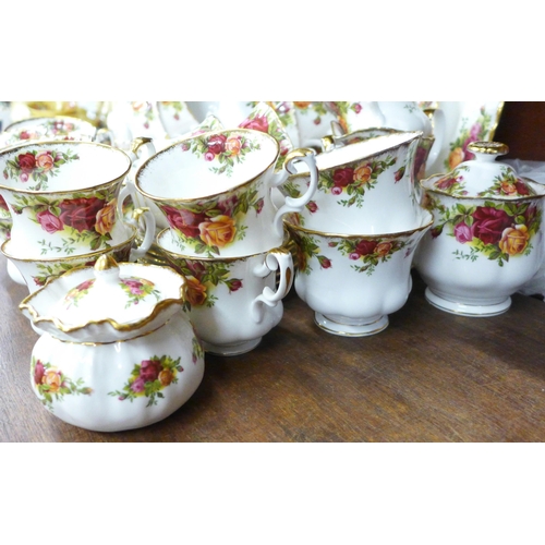 706 - A Royal Albert Old Country Roses tea and coffee set with coffee pot, fourteen tea cups, nineteen sau... 