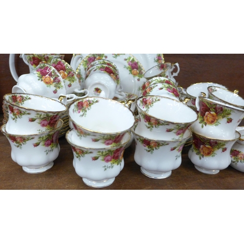 706 - A Royal Albert Old Country Roses tea and coffee set with coffee pot, fourteen tea cups, nineteen sau... 