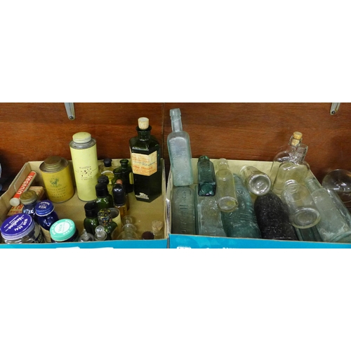 712 - A collection of bottles, mainly chemists bottles and some tins **PLEASE NOTE THIS LOT IS NOT ELIGIBL... 