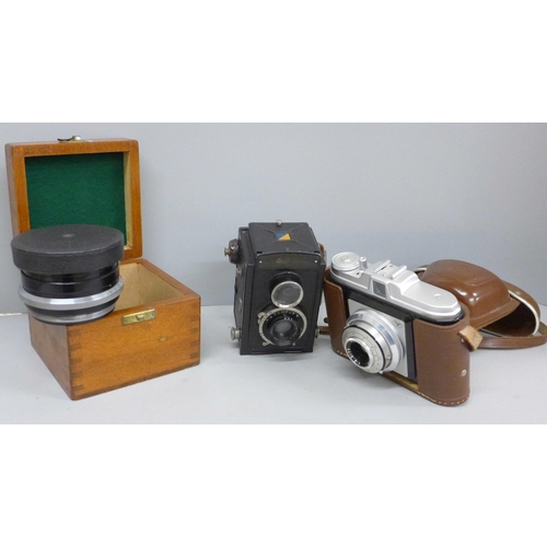 716 - A Voightlander camera, an Agfa camera and a Wray London Lustrar f.10 camera lense, cased