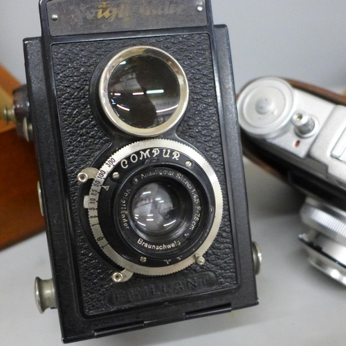 716 - A Voightlander camera, an Agfa camera and a Wray London Lustrar f.10 camera lense, cased