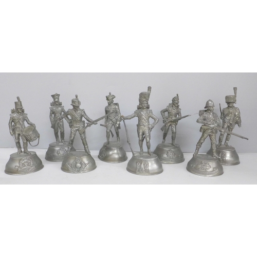 717 - A collection of eight pewter military figures