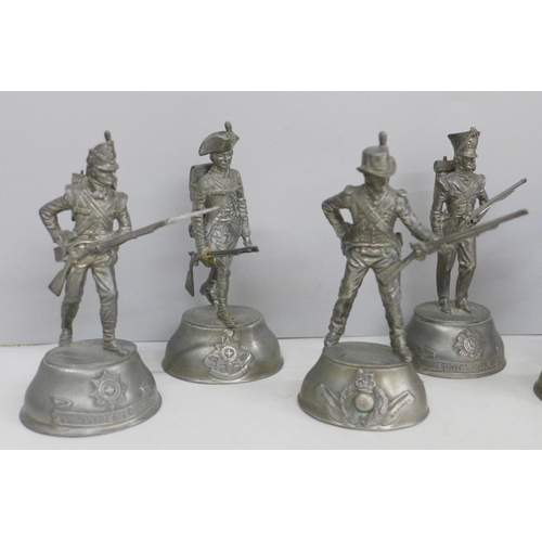 717 - A collection of eight pewter military figures