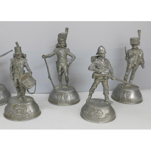 717 - A collection of eight pewter military figures