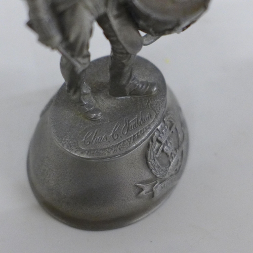 717 - A collection of eight pewter military figures