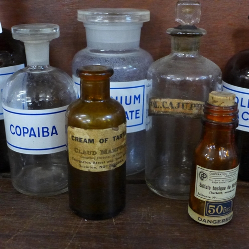 720 - Nine chemists bottles and two measures **PLEASE NOTE THIS LOT IS NOT ELIGIBLE FOR IN-HOUSE POSTING A... 