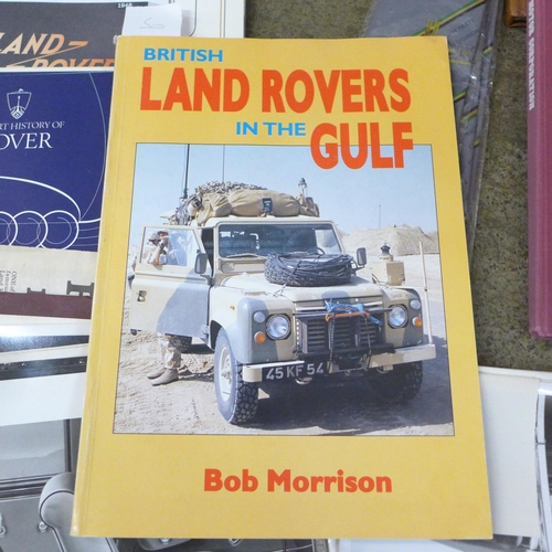 721 - A collection of Land Rover related items, mainly books, patches and some ties and photographs