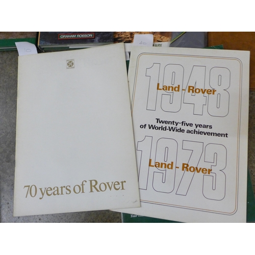 721 - A collection of Land Rover related items, mainly books, patches and some ties and photographs