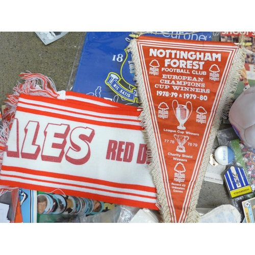 737 - Football memorabilia; pennants, a signed miniature football, programmes, etc.