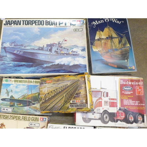 754 - A box of started/incomplete Tamiya, Airfix and Revell model kits