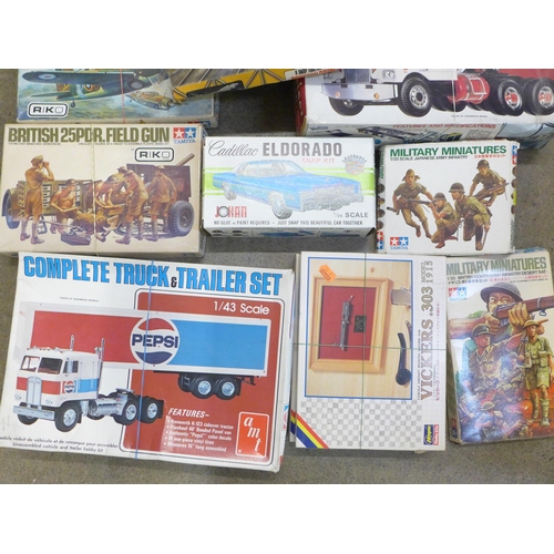 754 - A box of started/incomplete Tamiya, Airfix and Revell model kits