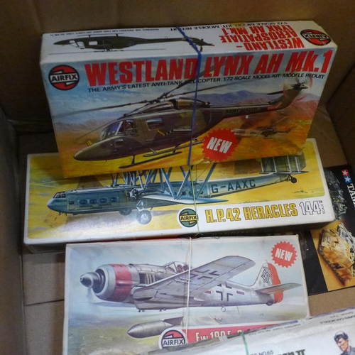 754 - A box of started/incomplete Tamiya, Airfix and Revell model kits