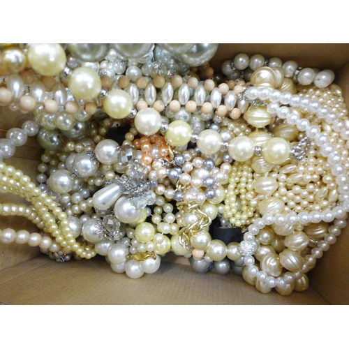 775 - A collection of faux pearl necklets and bracelets