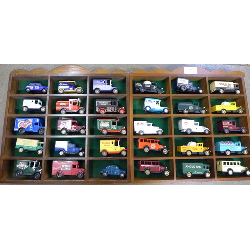 787 - Two display cabinets, each complete with fifteen vehicles with advertising