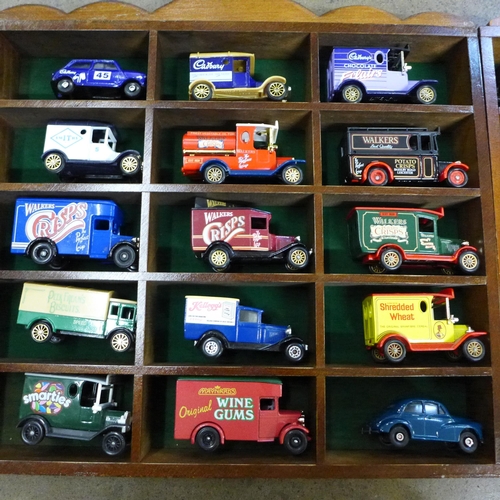 787 - Two display cabinets, each complete with fifteen vehicles with advertising