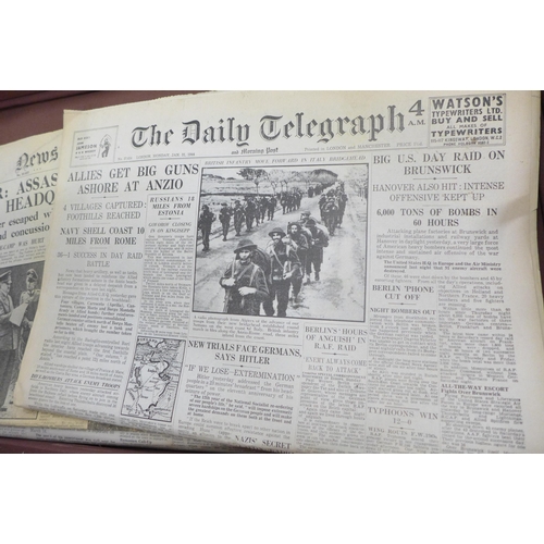 798 - A leather suitcase with a collection of WWII period newspapers, various editions