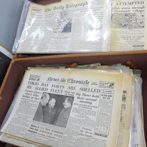 798 - A leather suitcase with a collection of WWII period newspapers, various editions