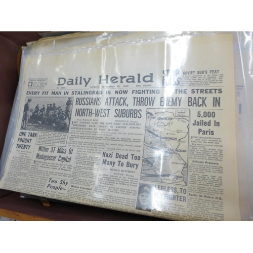 798 - A leather suitcase with a collection of WWII period newspapers, various editions